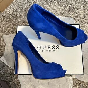 Super cute beautiful blue suede peep toe heel by Guess!